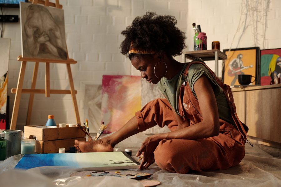 Artist painting in a studio — accountancy for creatives