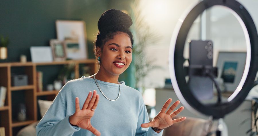 Creator filming with a ring light — accountancy for content creators