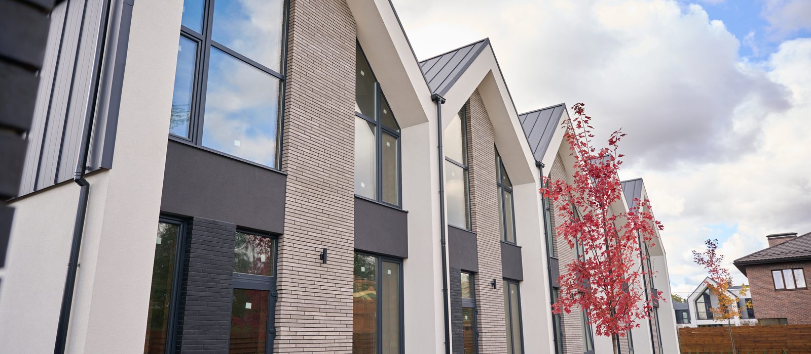 Modern townhouses — property investment and SPV accounting